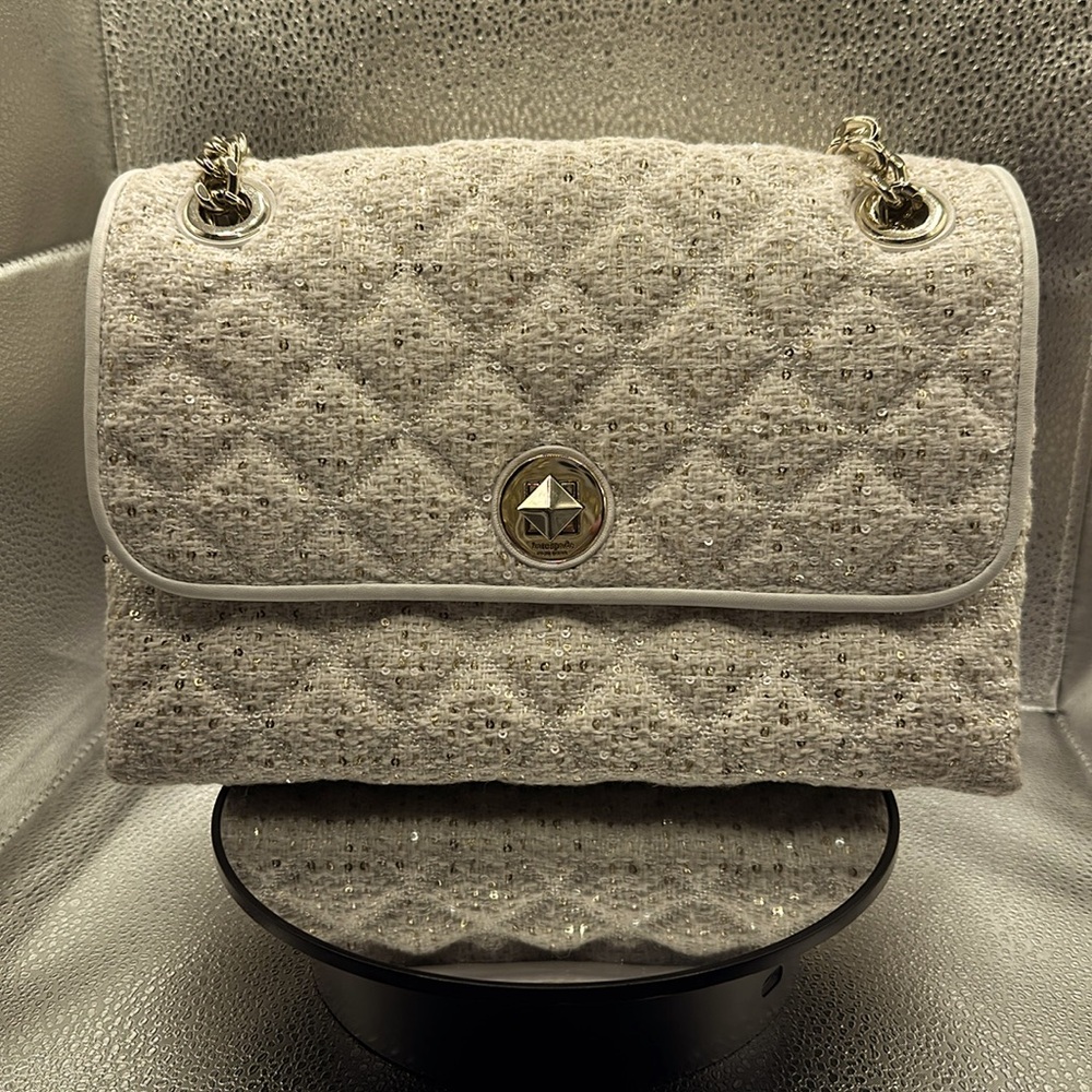 Stunning cloth Kate Spade. Can be handbag or crossbody with adjustable straps